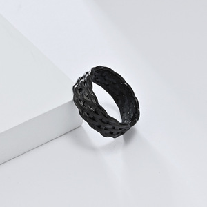 Unique, stylish, androgynous woven braided <b>titanium</b> steel <b>ring</b> for men and women, exuding sophistication and elegance. - Product Image 4