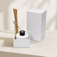 Boîte cadeau rigide blanche personnalisée avec revêtement UV et estampage à chaud pour parfums, cosmétiques et cadeaux d'affaires
