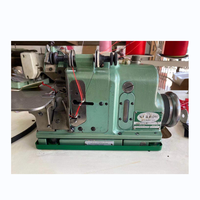 Machine à coudre industrielle surjeteuse à 3 fils Merrow d'occasion pour la bordure des emblèmes