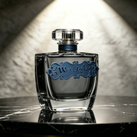 Flacon de parfum noir mat de luxe personnalisé avec étiquette métallique et plaque nominative à logo en relief