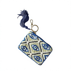 Monedero artesanal de cuentas con ojo turco y borla, estilo bohemio, con cremallera y llavero - Product Image 1