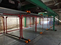 Système de stationnement robotisé à plusieurs étages, système de stationnement automatique des véhicules, parking vertical compact