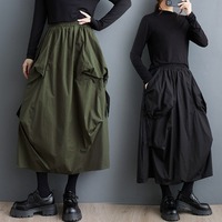 Nouvelle jupe longue fluide décontractée vert olive pour femme, taille élastique, poches plaquées, bretelles, collection automne 2026, vente en gros