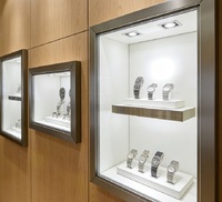 Aménagement de boutique de bijoux de luxe sur mesure, comptoirs et armoires murales de présentation de bijoux en bois massif de qualité supérieure pour la vente au détail de luxe
