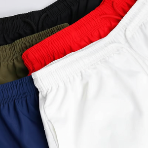 Pantalones cortos de hombre de poliéster 100% con logotipo personalizado de verano de alta calidad Pantalones cortos de nailon de gimnasio multicolor para hombre - Product Image 1