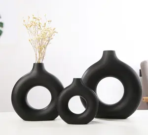 Table nordique décorative creux blanc noir rose fleur Vase anneau donut vase lisse bouteille en céramique pour faux floral intérieur