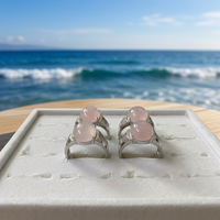 Vente en gros d'anneaux fins en cristal de quartz rose naturel de forme ovale argentés réglables