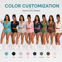 Ensemble deux pièces sportswear femme été 2026 en tricot gaufré uni, personnalisable, respirant, à manches longues, avec capuche, short et ceinture zippée
