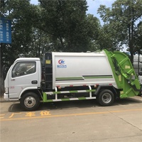 2025 vente chaude 4x2 lecteur 4cbm compacteur camion à ordures Diesel Transmission manuelle avec moteur moteur boîte de vitesses composants de base
