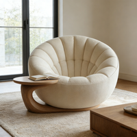Fauteuils pivotants contemporains ronds et confortables, canapé design unique en forme de pétale avec table d'appoint intégrée, mobilier de réception pour hall d'hôtel