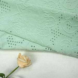 Vente en gros textile trou jacquard tricoté tissu teint uni élasthanne spandex telas punch tissus jacquard <span class=keywords><strong>pour</strong></span> vêtements - Product Image 6