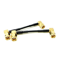 Suministro de fábrica SMA macho enchufe RA codo a RP Sma macho RA ángulo recto Rg174 Pigtail Jumper Cable montaje ROHS 30cm en Stock
