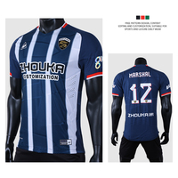 OEM Maßgeschneiderte Premium Jacquard Sublimations-Fußballtrikots Hersteller Laserperforiertes V-Ausschnitt Fußballshirt Team-Uniform für Spiele