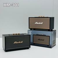 Nouveau haut-parleur portable d'extérieur en bois XM301 Retro 5.0 avec subwoofer 10W, radio FM intégrée et batterie, design compact