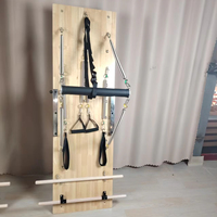 Tour de Pilates murale professionnelle en bois d'érable avec ressorts réglables et barre de poussée pour la maison et le studio