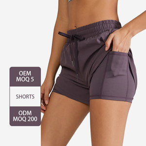 YK183 recién llegado pantalones cortos atléticos de delfín con cordón de cintura media con bolsillos de forro pantalones cortos de Yoga ligeros sueltos informales para correr - Product Image 1