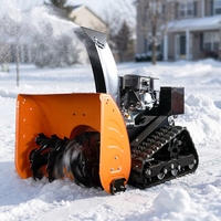 Souffleuse à neige sans fil télécommandée avec châssis à chenilles et capacité de franchissement de pente à 45 degrés pour les équipes d'exploitation des stades