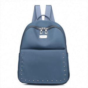 Échantillon gratuit 2023 : sac à dos mini tendance pour fille, design coréen, rivets jaunes, populaire, vente en gros - Product Image 1