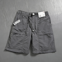 Shorts cargo en nylon légers à séchage rapide avec logo personnalisé, ceinture élastique, ceinture en sangle, poche zippée, style Gorpcore, pour la randonnée et les activités utilitaires