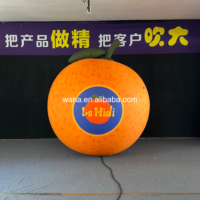 Modèle de tranche d'orange géante gonflable, ballon publicitaire personnalisé en forme de fruit des agrumes pour la promotion de bars à jus et les événements.