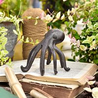 Statue de pieuvre en fonte Sculpture mignonne de table décorative sur étagère ou bureau Support créatif pour téléphone portable Support de pieuvre