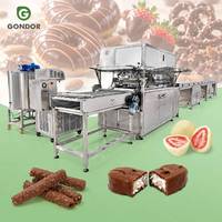 Chaîne de production de chocolat automatique à plusieurs niveaux avec tunnel de refroidissement, ligne d'enrobage et mouleuse à barres pour la fabrication de truffes