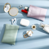 Vente en gros sac d'obus fermé automatique en cuir PU mini poche pochette cosmétique de rouge à lèvres sac de bijoux de maquillage d'éclats d'obus
