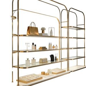 Exhibidor de Perfumes de Metal de Alta Calidad, Moderno, con Base de Alambre, para Uso Comercial, Cosméticos y Aceites Esenciales - Product Image 1