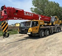 Grue sur camion Sany STC1000 d'occasion, flèche principale de 58 m, capacité de 100 tonnes, hauteur de levage de 86 m, flèche de 18 m, contrepoids de 32 tonnes, pour projets de construction lourde