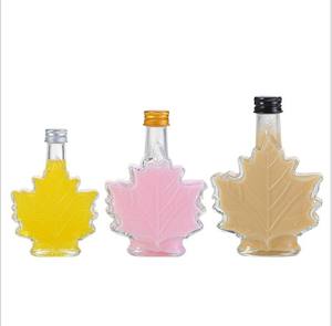 Bouteille en verre de sirop unique en forme de feuille d'<span class=keywords><strong>érable</strong></span> d'une capacité de 50ml 100ml 250ml pour la tequila et le <span class=keywords><strong>rhum</strong></span> foncé avec couvercle - Product Image 3