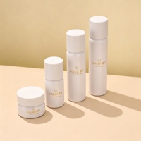 Emballage de luxe pour soins de la peau en verre peint avec couvercle, emballage unique pour soins de la peau, comprenant un flacon de fond de teint en verre et un pot de crème.