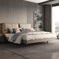 Lit double king size moderne et minimaliste en cuir véritable avec cadre en métal haut de gamme et rembourrage luxueux pour chambre principale