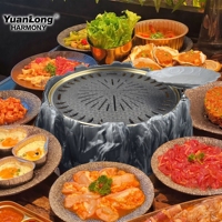 Poêle à charbon en pierre volcanique ronde pour les restaurants et les établissements de barbecue coréen