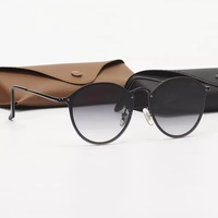 Lunettes de soleil unisexes tendance de marque de créateur, sans monture, en métal, protection UV, verres polarisés ronds pour femmes