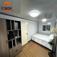 Maison modulaire extensible Cbox avec terrasse et mobilier complet, 2 chambres, type resort