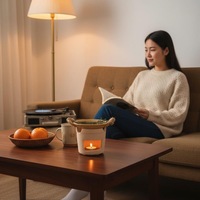 Diffuseur de cire aromatique résistant à la chaleur, à combustion sèche sécurisée, avec poignée en corde de chanvre vintage et design ajouré, conçu pour la chauffe.