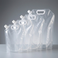 Pochette souple transparente robuste en PE de 0,2 mm avec bec verseur, poignée supérieure en plastique et bouchon à vis pour recharge de jus liquide