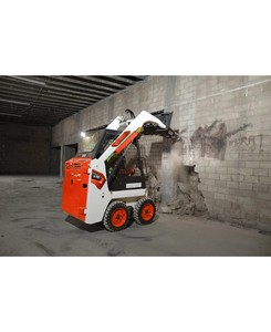Chargeuse compacte sur pneus S76 de la série R, 1338 kg, 74 CV, avec brise-roche hydraulique et grappin à matériaux - Product Image 4