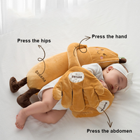 Oreiller apaisant pour bébé de 55 cm personnalisé en usine, jouet en peluche apaisant à télécommande en forme de banane de dessin animé, avec fonction de tapotement de la paume