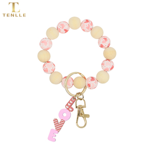 <span class=keywords><strong>Grossiste</strong></span> Bracelet de perles de <span class=keywords><strong>silicone</strong></span> à la mode Porte-clés Saint Valentin en bois personnalisé Porte-clés en bois avec impression UV pour porte-clés en métal - Product Image 2