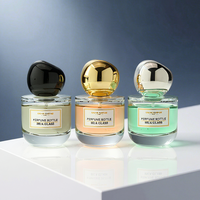 Flacon de parfum sphérique en verre vide 50ml 100ml, personnalisable OEM ODM avec logo et forme sur mesure, atomiseur à fine brume avec estampage à chaud doré et boîte