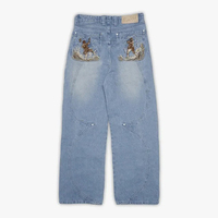 Pantalon en jean délavé et déchiré à jambe large et coupe ample, style européen streetwear, avec poches surpiquées, pour homme – Tendance et stylé