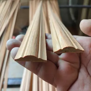 Cornice modanature in legno di teak ricami bordi in legno finiture in legno