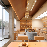 Guichet unique, présentoir à pain et table de préparation des boissons pour toasts, croissants et déjeuners légers