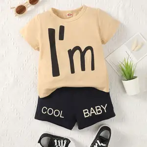 Aangepaste Brief Bedrukt Korte Mouw Zomer Luxe Bulk Groothandel Jongens Kinderkleding Voor 2-12 Tweedelige Bijpassende T-Shirt Set