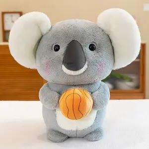 YWMX 25 cm Brinquedo de pelúcia coala em pé, travesseiro de pelúcia fofinho com futebol, brinquedo de pelúcia para presente, travesseiro de boneca