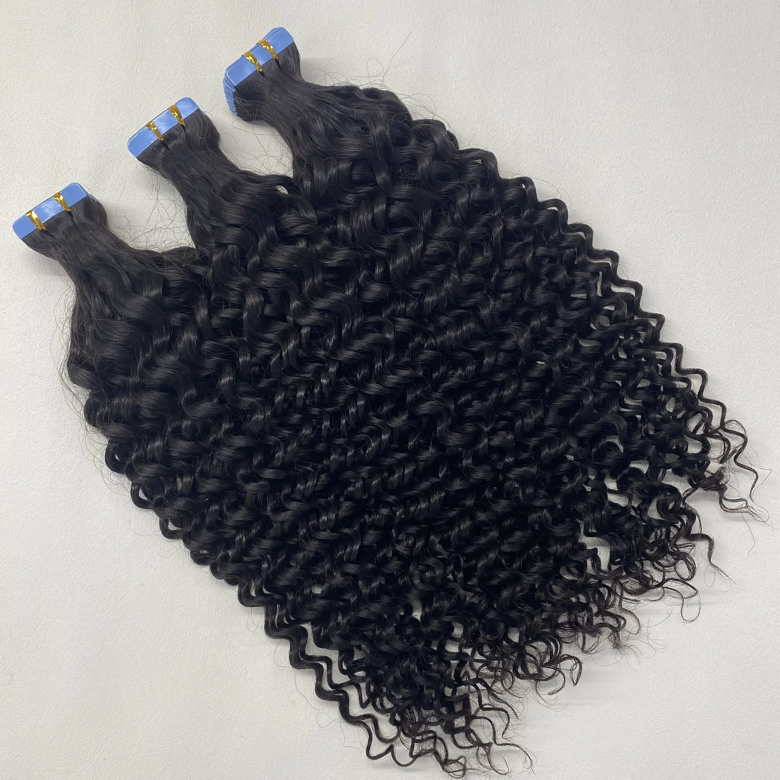 Raw Indian Virgin Natural Human Hair Double Drawn slightly water wavy and curly Tape in Hair extension Remy Hair Curly Tape ins