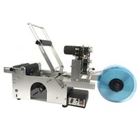 Étiqueteuse semi-automatique pour bouteilles rondes avec codage de date pour flacons et bouteilles rondes en plastique