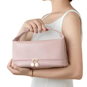 Borsa per il trucco con Logo personalizzato borsa da viaggio portatile in pelle Pu di alta qualità di nuova moda di borse per cosmetici da viaggio da donna
