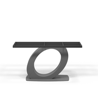 Table à manger contemporaine de luxe italienne sculpturale avec piétement en pierre frittée et base en acier carbone gris anthracite pour villa